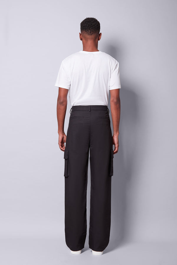 Bravian model wearing trousers cargo black back