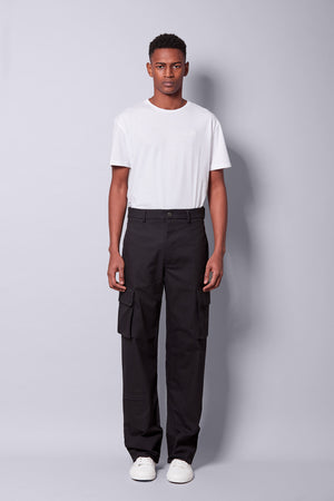 Bravian model wearing trousers cargo black front