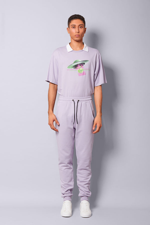 Bravian model wearing trousers bravianactive digital lavanda front